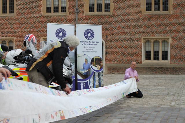 Ron Common holding the scroll